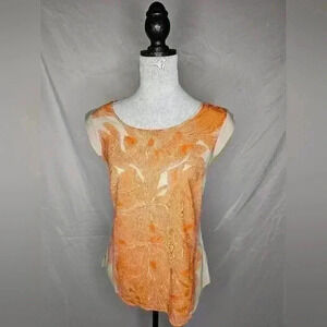 The limited extra small orange and beige floral shirt